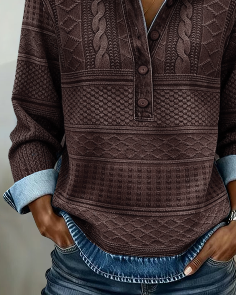 Close-up of the brown version's front from chest to hem, showing the button placket, textured stripes and blue denim-look hem. 5