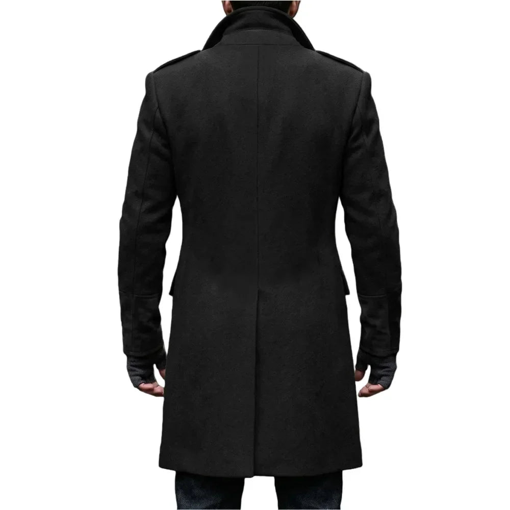Back view of the black overcoat on a model, with epaulettes, collar and fingerless gloves 20