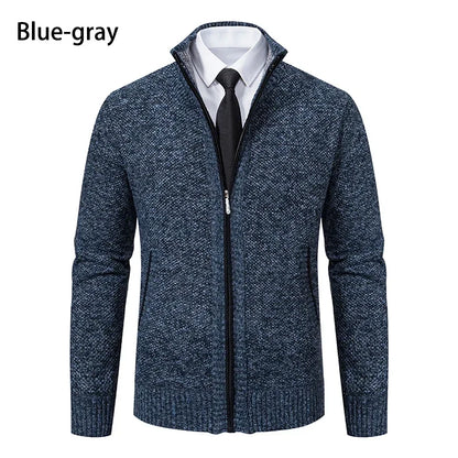 Front view of the blue-grey marl cardigan, zipped partly open over a white shirt and black tie 21