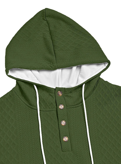 Close-up of the olive green textured hood, white lining, drawcords and four-button placket 21