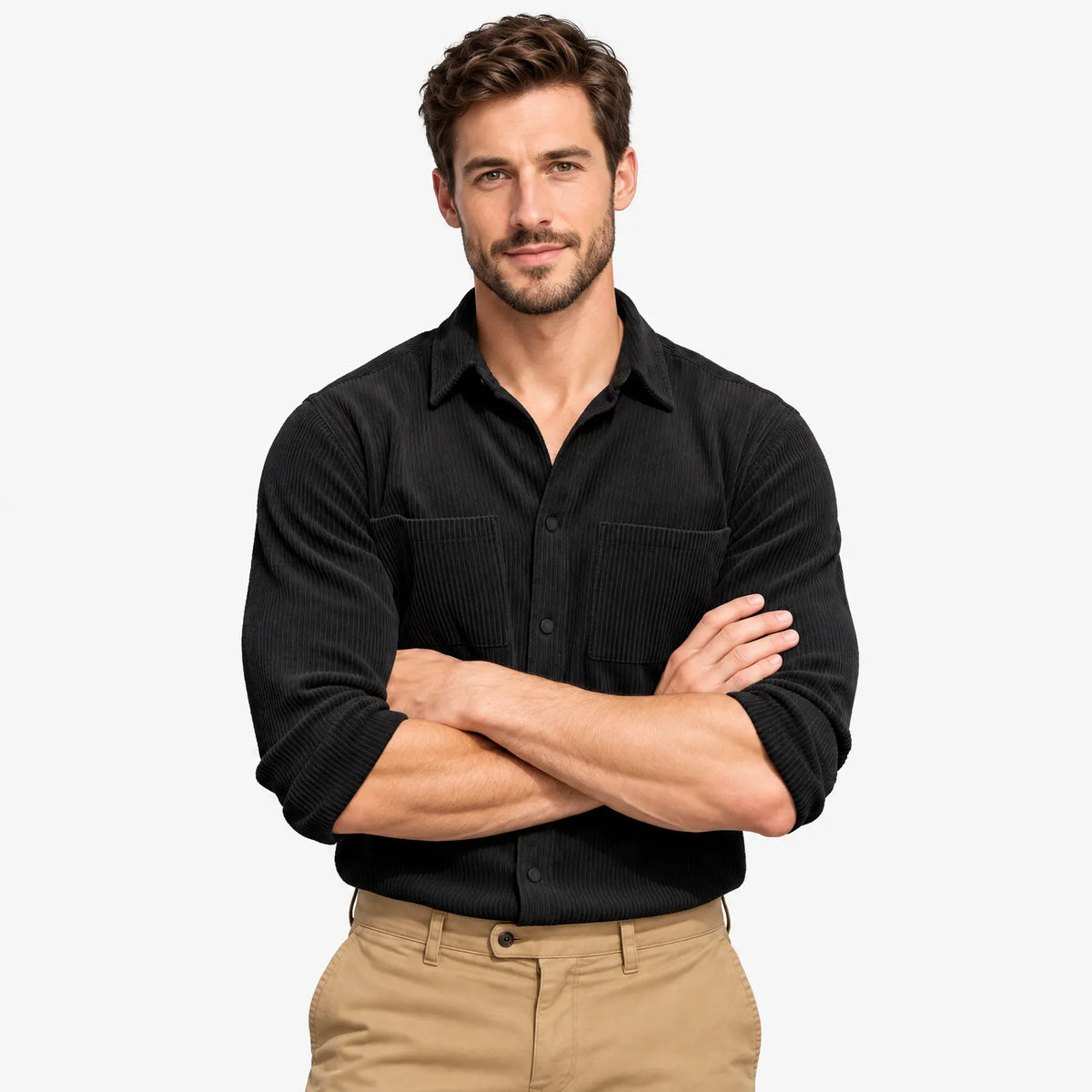 Man in a black ribbed corduroy shirt with two chest pockets, arms crossed, worn with tan chinos 21