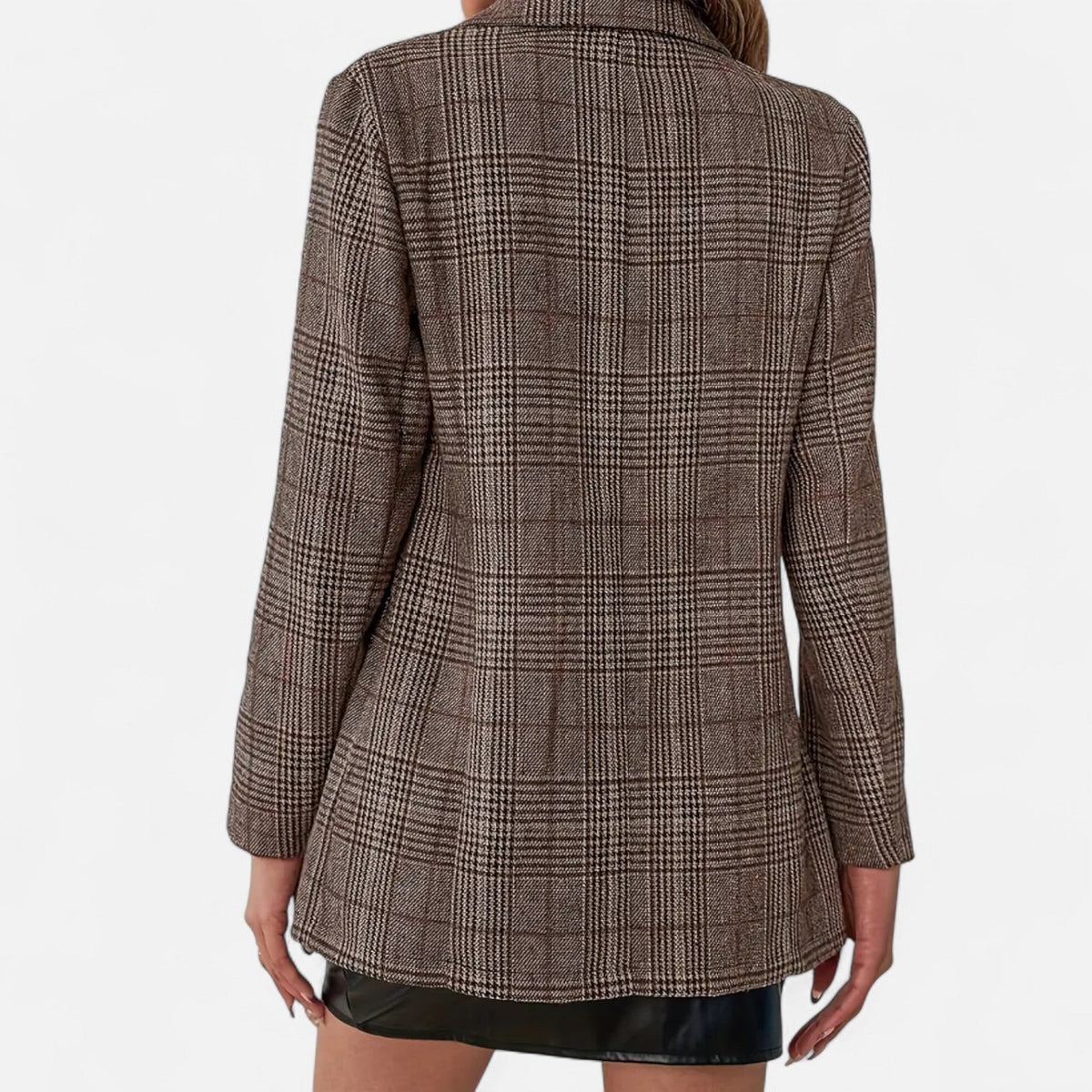 Close-up of the back of the brown check blazer on a model, showing the woven pattern and fitted shape. 4