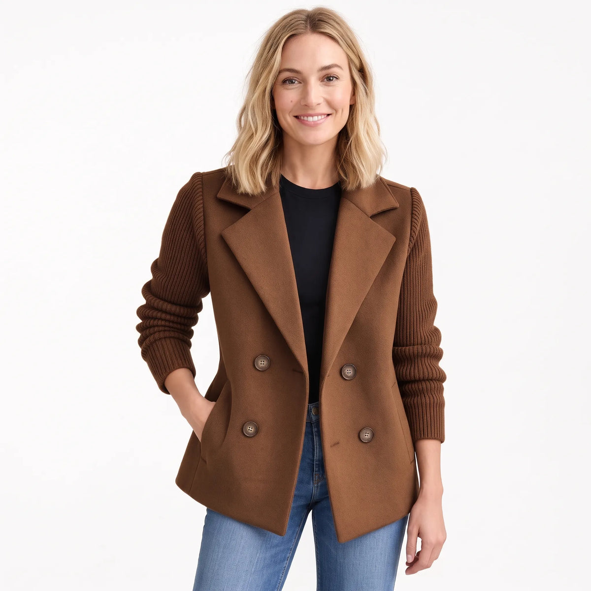 Smiling model in the chocolate brown version, ribbed sleeves and horn-style buttons, worn open over jeans 22