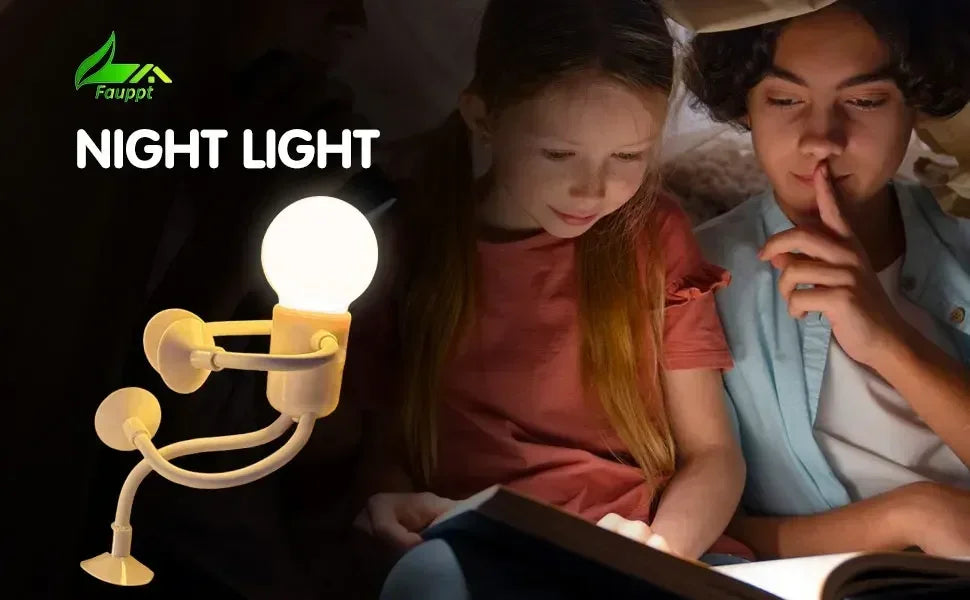 Glowing figure light with suction-cup limbs beside two children reading a book in the dark 22