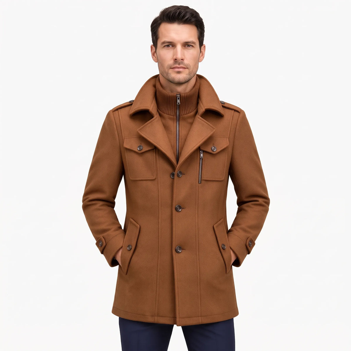 Man modelling the tan-brown overcoat from the front, ribbed inner collar zipped up beneath the lapels 23