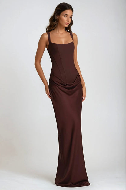 Three-quarter view of the brown maxi dress showing the corset seams and draped hip gathering 6