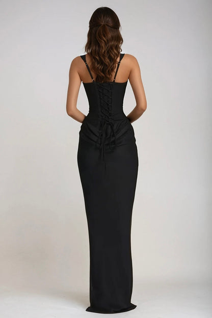 Back view of the black dress on a model, showing lace-up corset back and thin adjustable straps 27