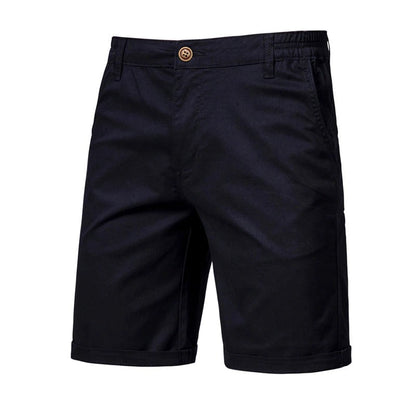 Front view of the shorts in black, with a button fastening, side pockets, belt loops and rolled hems. 6