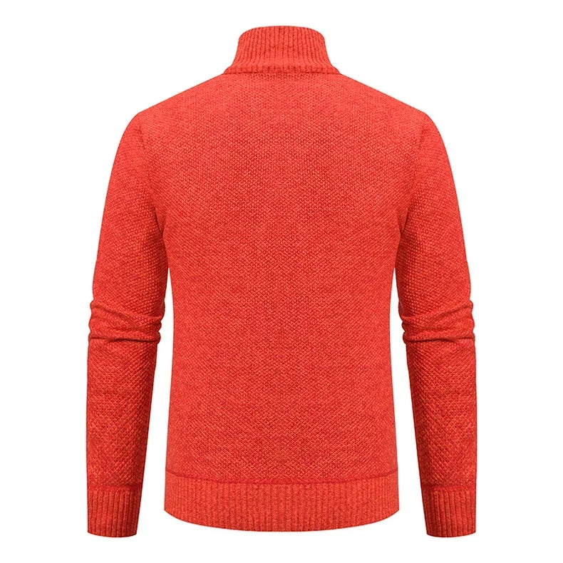 Back view of the orange cardigan, showing the plain knit, ribbed collar and ribbed hem 25