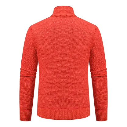 Back view of the orange cardigan, showing the plain knit, ribbed collar and ribbed hem 25