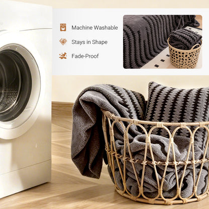 Washing machine beside a wicker basket holding the folded grey cover and a cushion, with a small inset of the cover 5