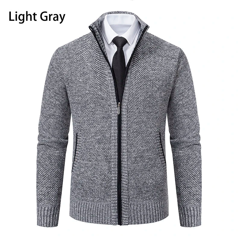 Front view of the light grey marl cardigan with black zip, over a white shirt and tie 26