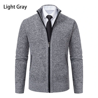 Front view of the light grey marl cardigan with black zip, over a white shirt and tie 26