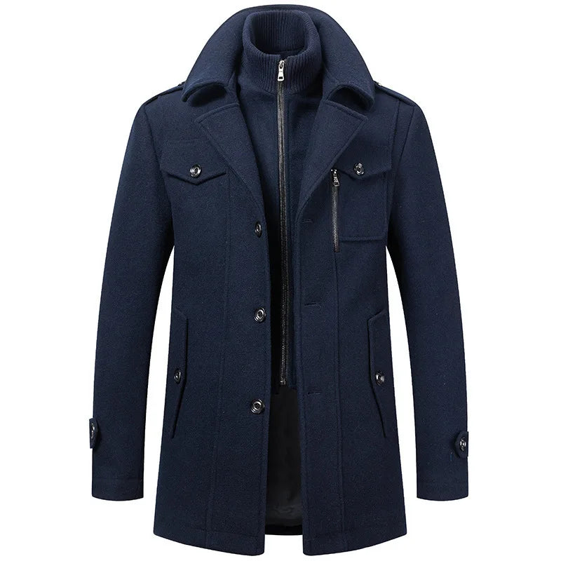 Navy coat laid flat from the front, showing the zip-up knitted inner collar and flap pockets 2