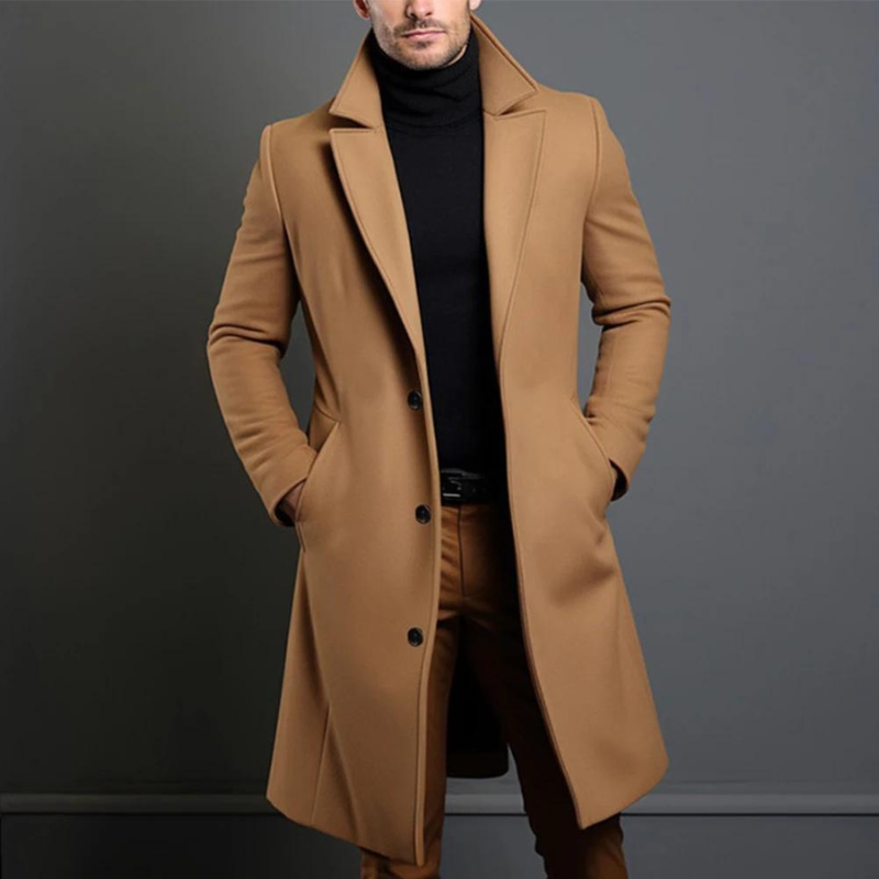 Model wearing the camel version of the longline coat with notch lapels and three buttons, styled with a black roll-neck. 2