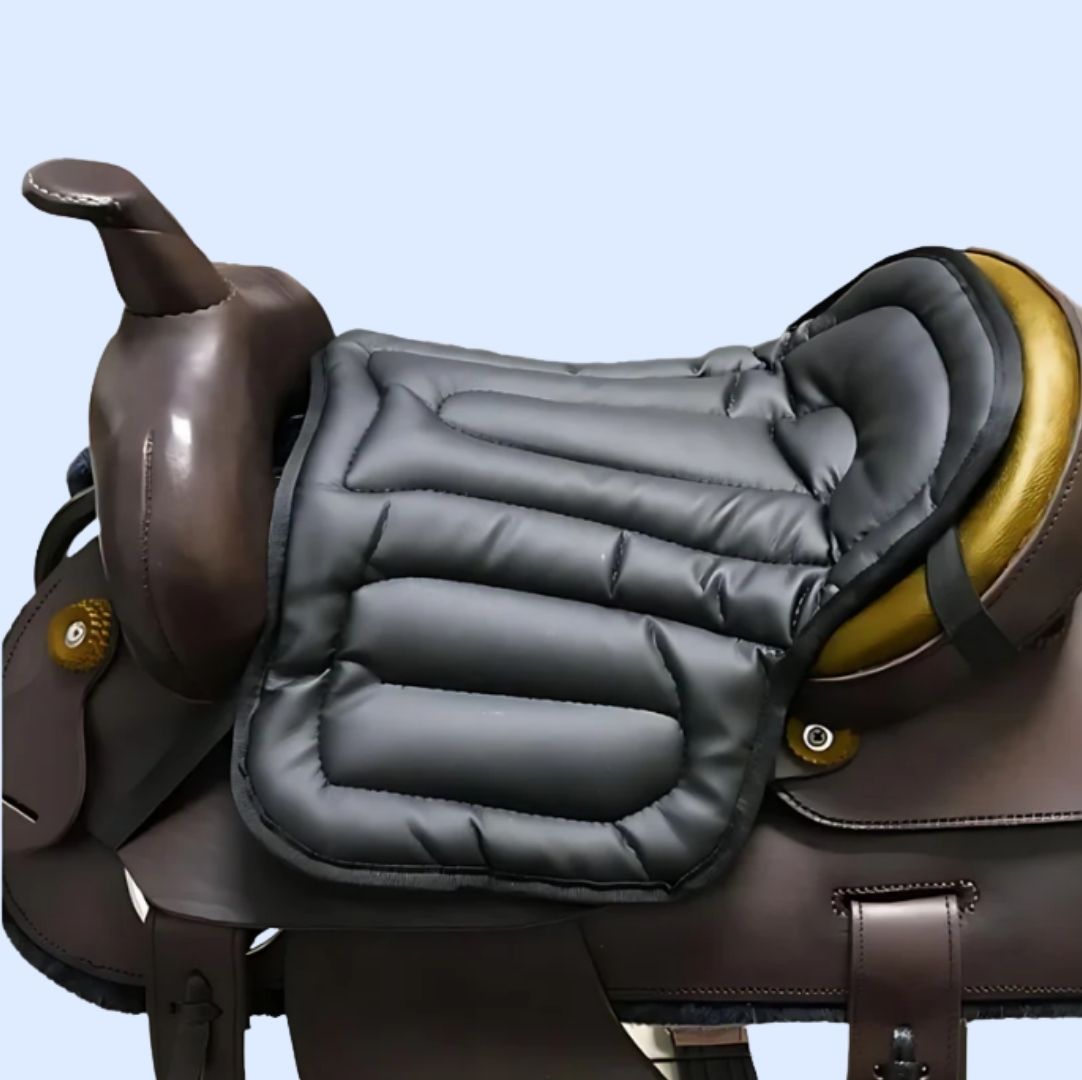 Grey padded seat cushion resting on a brown western saddle with gold-coloured seat, shown from the side 2