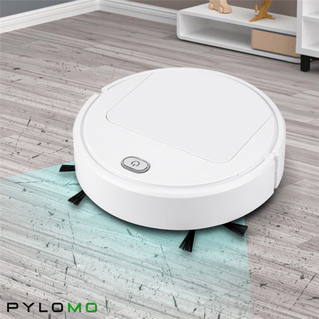 White robot cleaner on a worn grey wooden floor in a living room, with a shaded cleaning path in front. 3