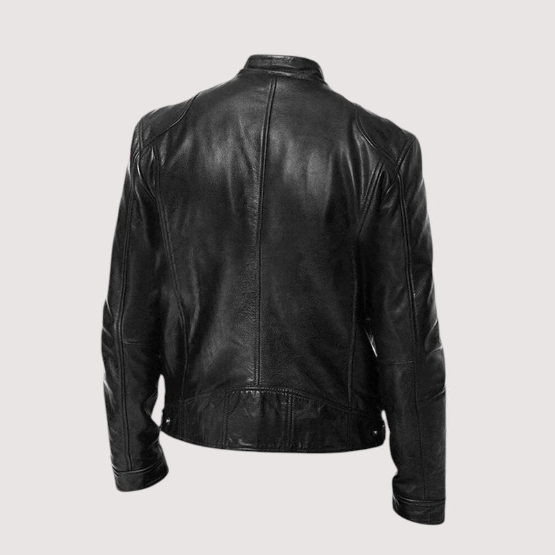 Back view of the black leather jacket showing panelled seams and snap-tab hem 3