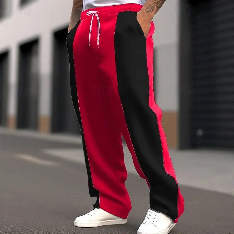 Street shot, lower body, of red and black colour-block sweatpants with white drawstring 2