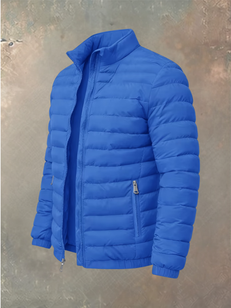 Bright blue quilted puffer jacket with unzipped front, angled view showing zip pocket and elasticated cuffs 1