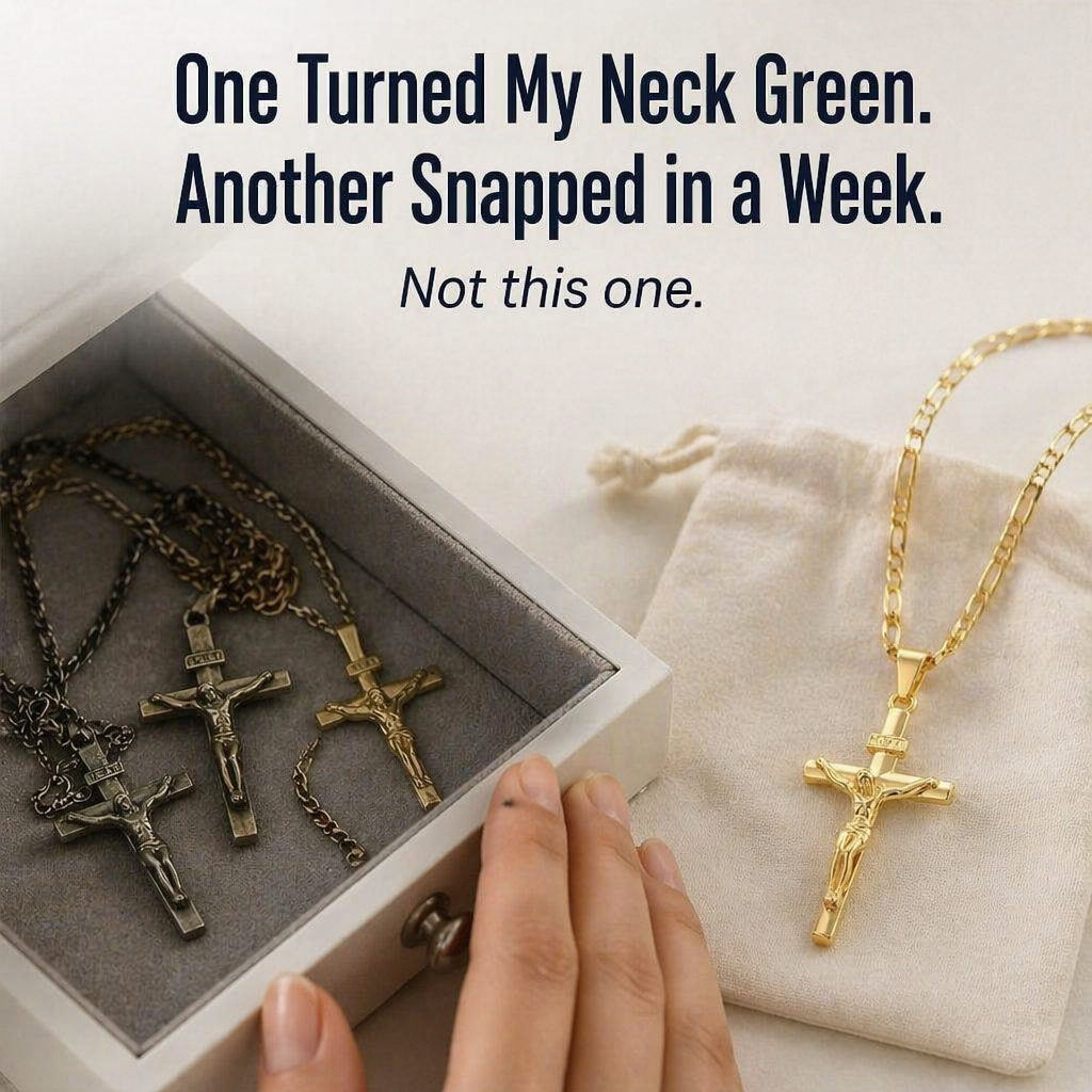 Gold crucifix necklace lying on a cream pouch beside a jewellery box of tarnished, darker crosses 3