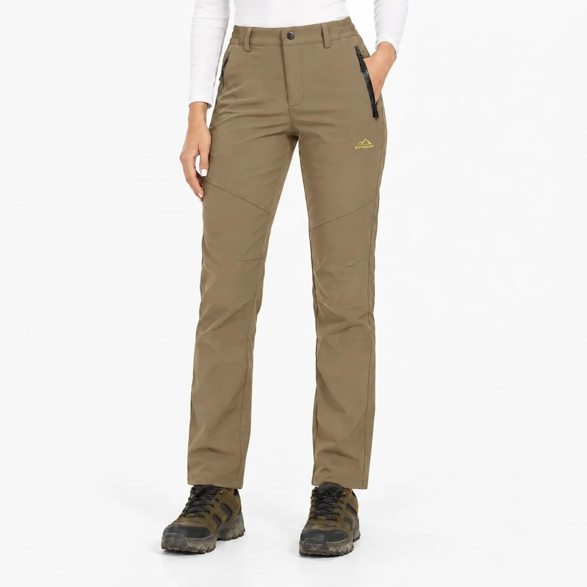 Tan brown trousers worn by a model in a studio, front view with zipped pockets 10