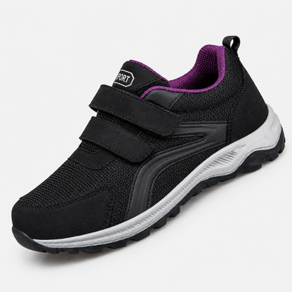 Black double-strap shoe with a purple collar lining and light grey sole, angled front view 8