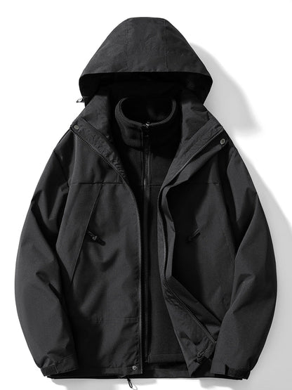 Front view of the all-black version, hood up and outer zip open, revealing the black fleece liner and drawcord pockets. 2