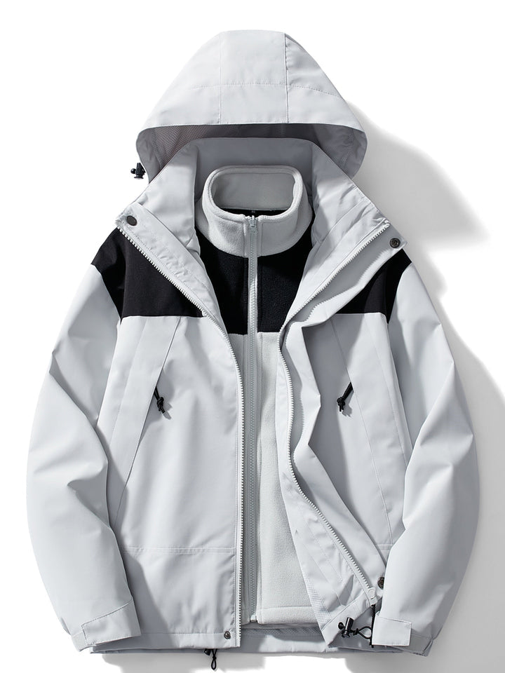 Front view in light grey with black shoulder panels, outer shell unzipped to show the grey fleece liner inside. 3