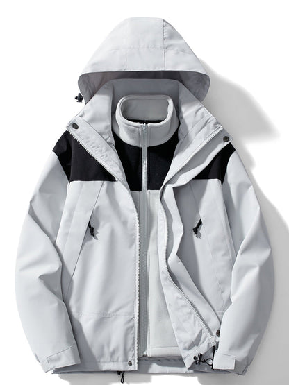 Front view in light grey with black shoulder panels, outer shell unzipped to show the grey fleece liner inside. 3