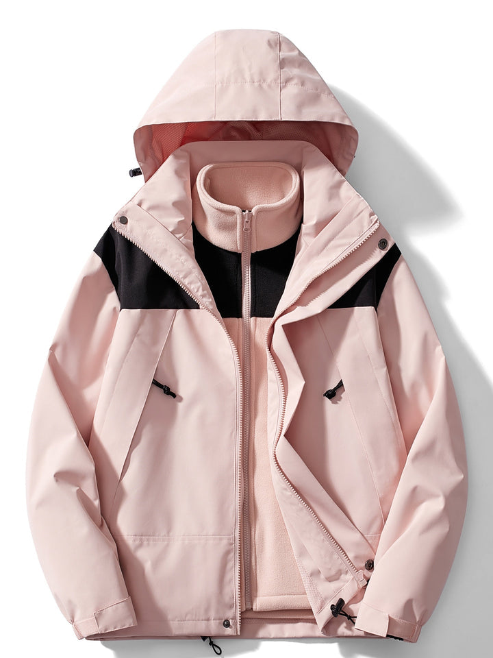Front view in soft pink with black shoulder panels, outer layer open to show the pink fleece liner beneath the hood. 6