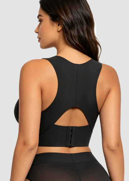 Back view of the black bra on a model, showing the racer back, cut-out and hook closure. 16
