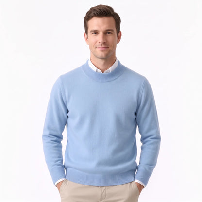 Man wearing the pale blue knitted jumper over a white shirt with beige trousers, front view 31