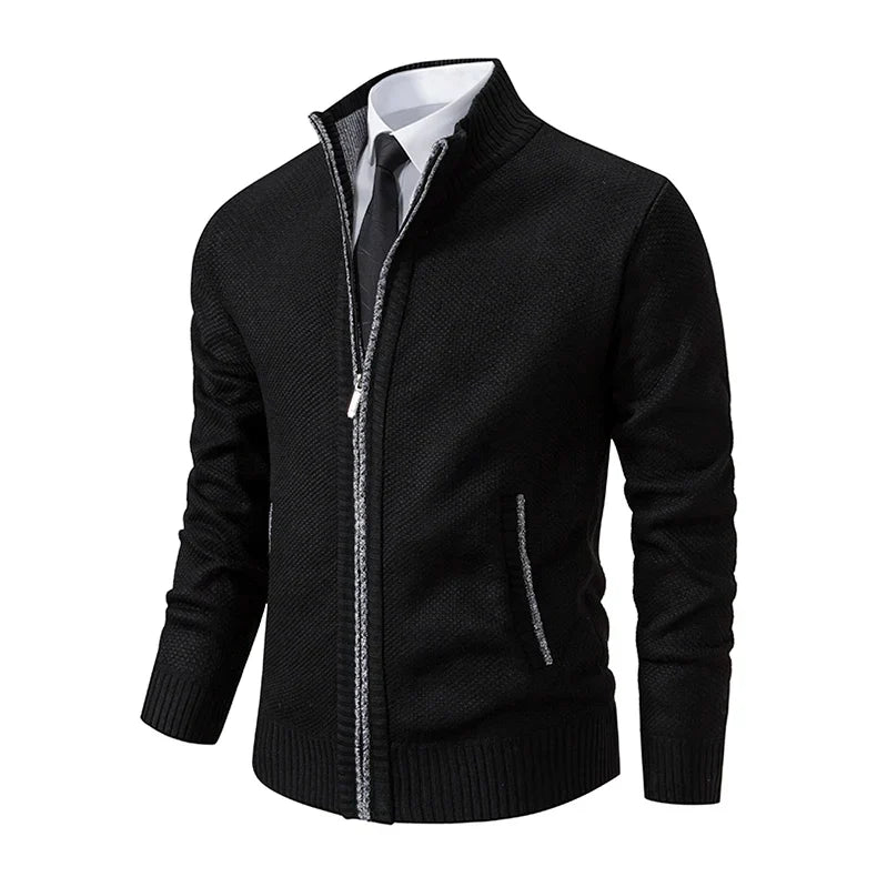 Angled view of the black cardigan with contrasting grey marl trim along the zip and pockets 32