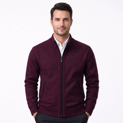 Model wearing the burgundy cardigan with black zip over a white shirt and dark trousers 34