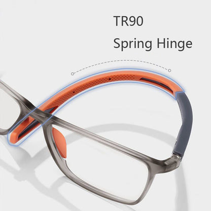 Close-up of the grey frame with an orange flexible arm and orange nose pad, highlighting the spring hinge and lightweight frame material. 6