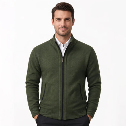 Model wearing the dark green cardigan zipped up over a white shirt and dark trousers 39