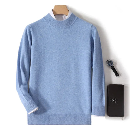 Light blue mock neck jumper on a hanger with white shirt layered underneath, watch and wallet alongside 3