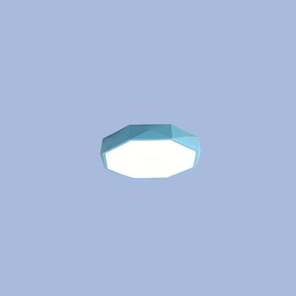 Blue faceted octagonal flush-mount light floating against a plain blue background 13