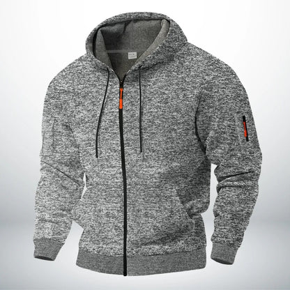 Front view of the zip-up hoodie in speckled light grey, with a soft grey hood lining, orange zip pull and zipped sleeve pocket. 3