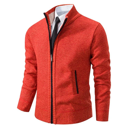 Red-orange zip cardigan seen from the side with a stand collar, black zip trim and a ribbed hem 3