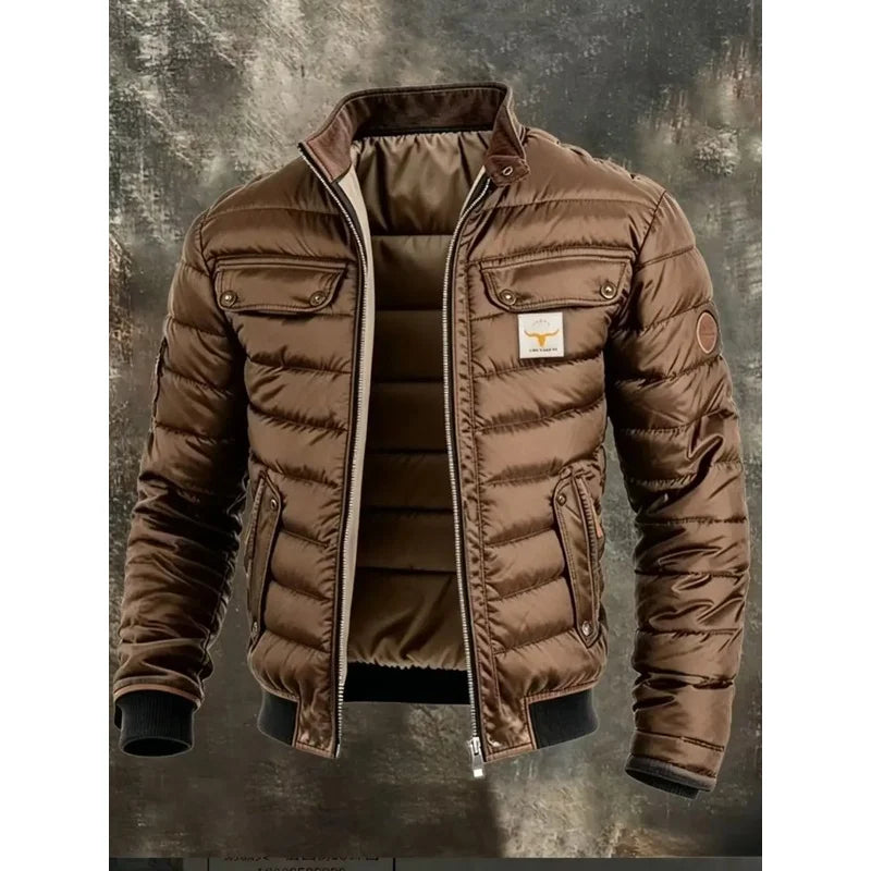 Brown version of the quilted jacket, unzipped to show the lining, on a textured grey backdrop 3