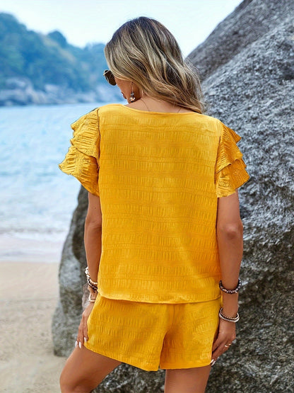Two-piece set with batwing sleeves and relaxed shorts – Livana