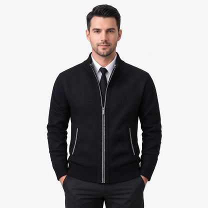 Model wearing the black cardigan with grey zip and pocket trim over a shirt and tie 40