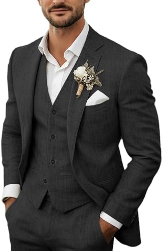 Model wears the charcoal suit with waistcoat, white shirt, floral buttonhole and white pocket square, in a deep, dark shade. 6