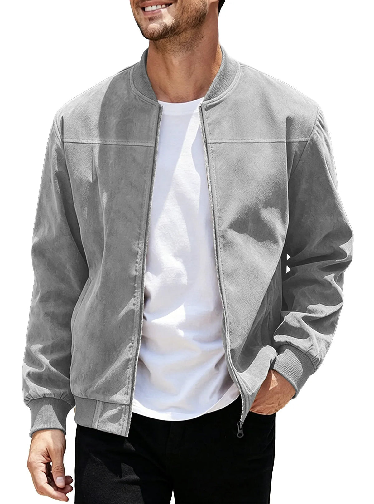 Smiling model wearing the light grey jacket unzipped over a white tee, one hand in pocket 44