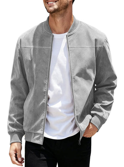 Smiling model wearing the light grey jacket unzipped over a white tee, one hand in pocket 44