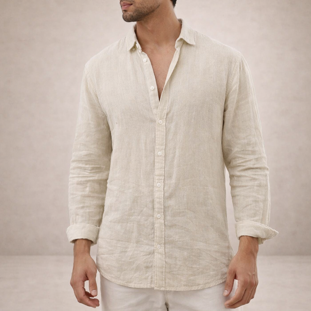 Natural beige linen shirt on a model with head turned, showing a soft crinkled texture and rolled sleeves. 6