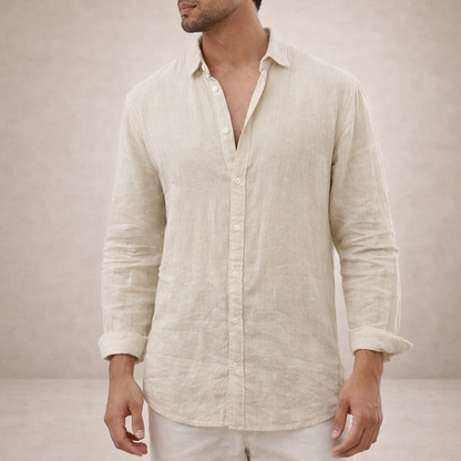 Natural beige linen shirt on a model with head turned, showing a soft crinkled texture and rolled sleeves. 6