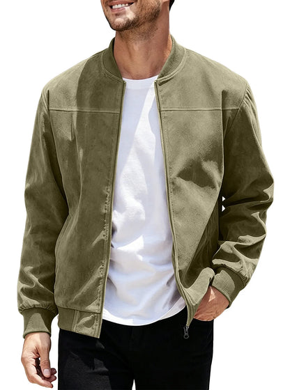 Smiling model wearing the olive green jacket unzipped over a white tee, one hand in pocket 46